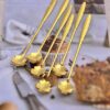 قاشق استیل فانتزی طرح گل طلایی کد 3009